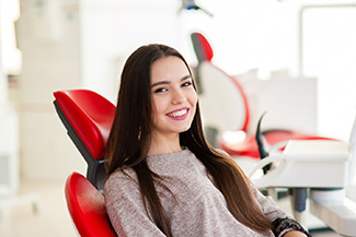 a patient visiting a cosmetic dentist in Viera