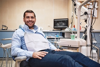 smiling male dental patient