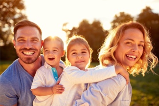 happy family with two small children