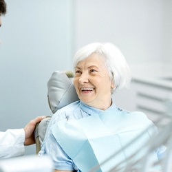 Denture dentist in Viera speaking with a patient