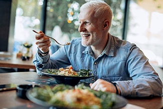 Man eating a salad