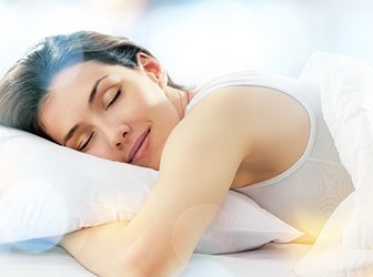 Woman sleeping with sleep apnea in Viera