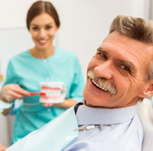 Senior man receiving dental care