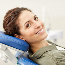 Woman smiling after seeing walk-in dentist in Viera 