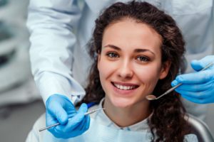 young woman getting checkup with dentist near Viera 