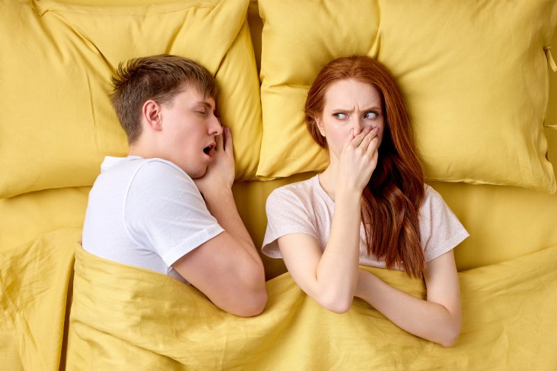 a couple experiencing morning breath in Melbourne